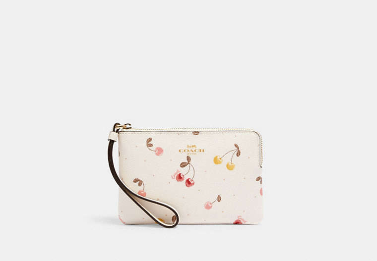COACH®,CORNER ZIP WRISTLET WITH PAINTED CHERRY PRINT,Gold/Chalk Multi,Front View