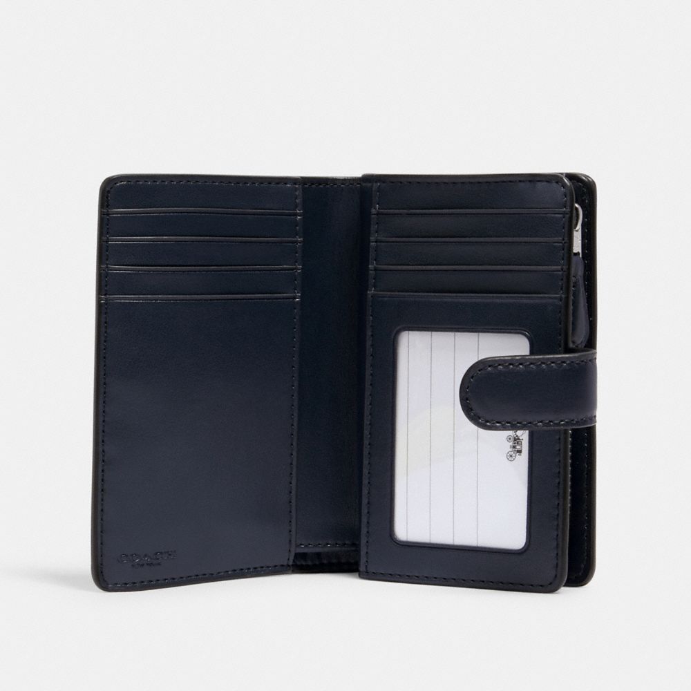 Medium Corner Zip Wallet In Signature Canvas With Snowflake Print