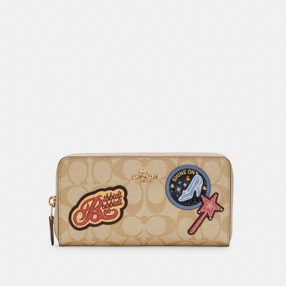 Portefeuille accordéon zippé Disney X Coach en toile Signature avec renforts