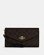 COACH®,TRAVEL ENVELOPE WALLET IN SIGNATURE CANVAS,pvc,Gold/Brown Black,Front View