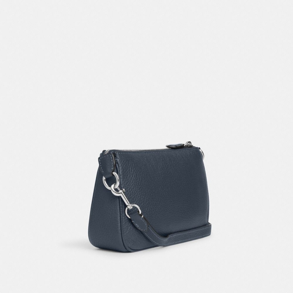 COACH Nolita Wristlet 19 in Polished Pebble Leather