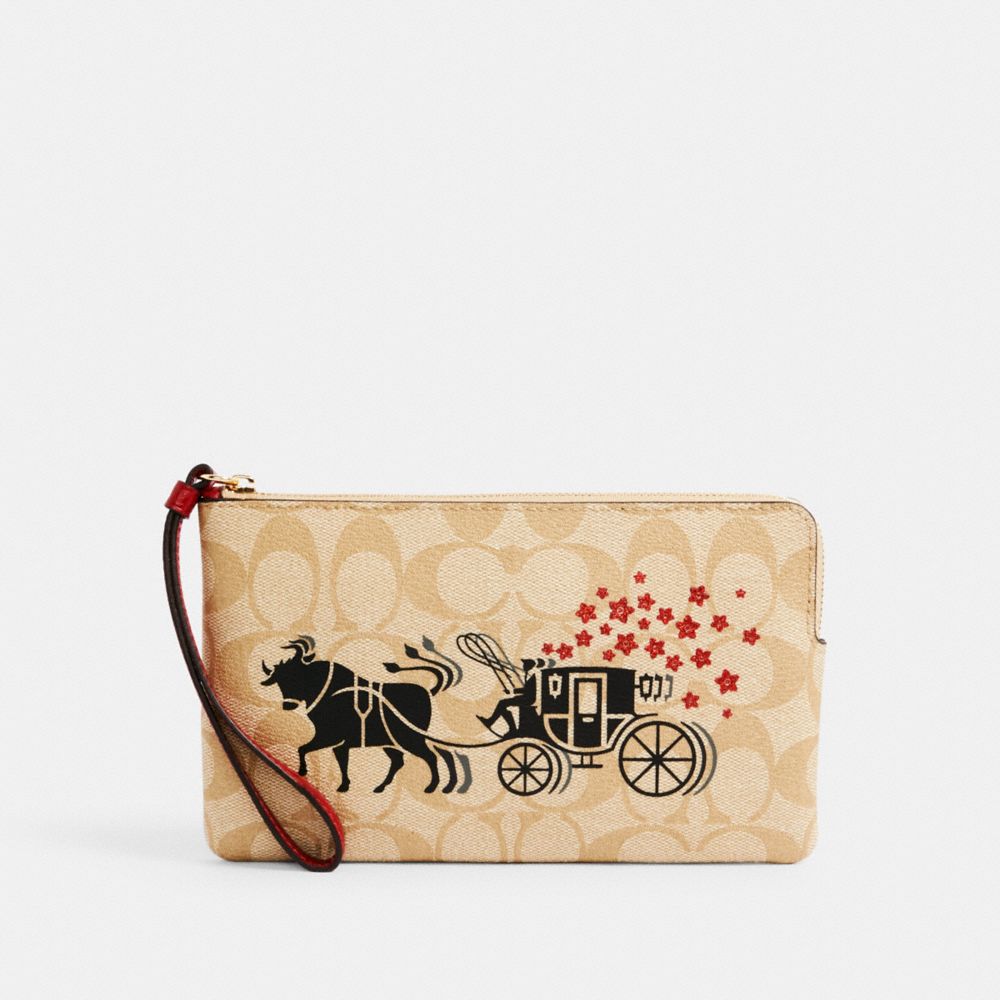 Grand wristlet à zip en coin Nouvel an lunaire en toile Signature avec bœuf et chariot