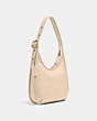 COACH®,ERGO SHOULDER BAG,Pebble Leather,Small,Brass/Ivory,Angle View