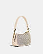 COACH®,SWINGER BAG 20 IN SIGNATURE JACQUARD,Signature Jacquard,Small,Brass/Stone Ivory,Angle View