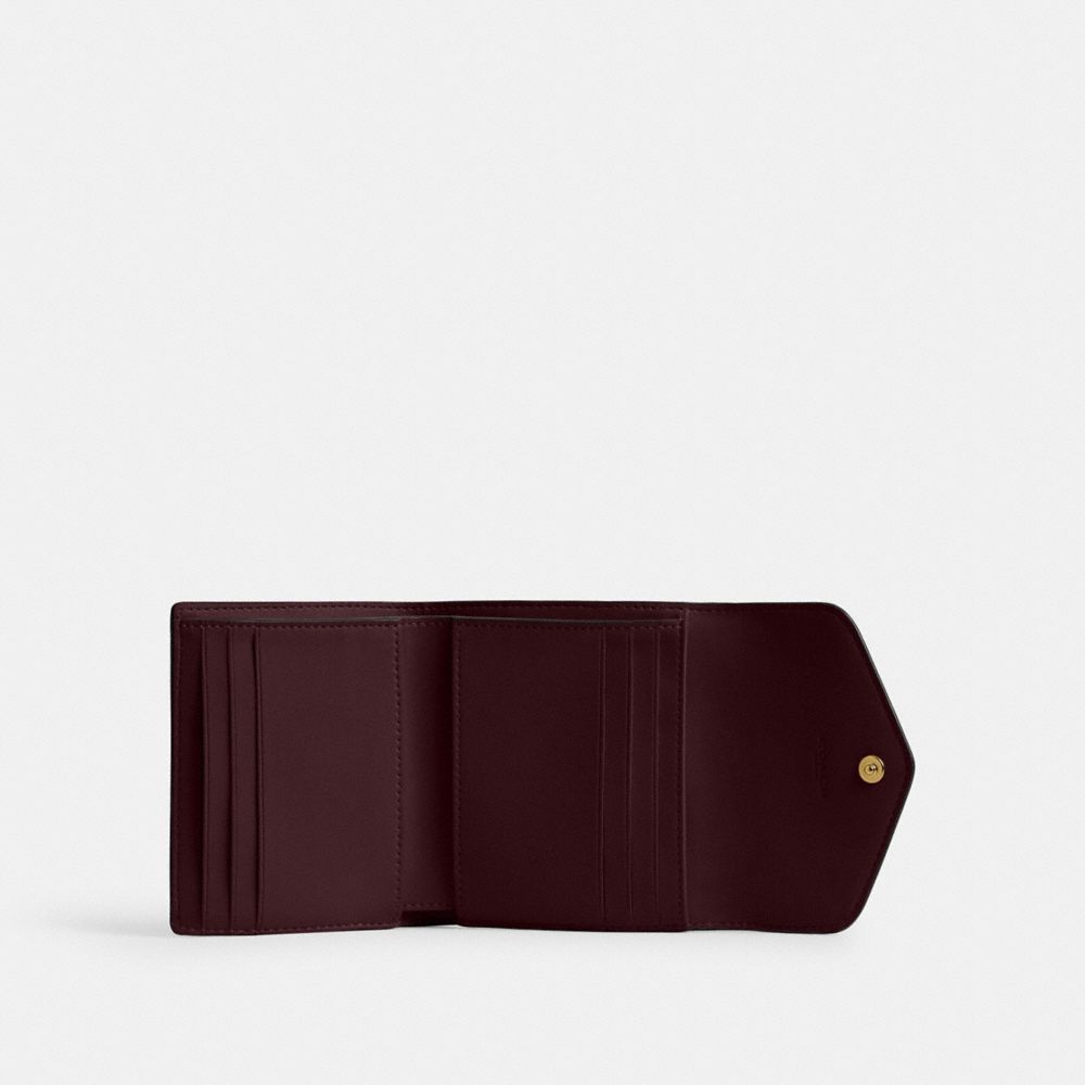 Shop Coach Wyn Small Wallet In Brass/merlot