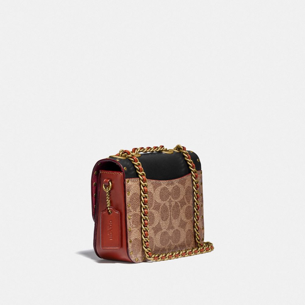COACH®,Madison Shoulder Bag 16 In Signature Canvas With Rivets,,Angle View