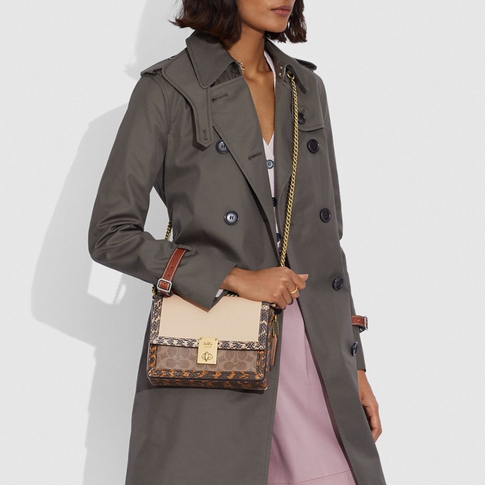 Hutton Shoulder Bag In Signature Canvas With Snakeskin Detail