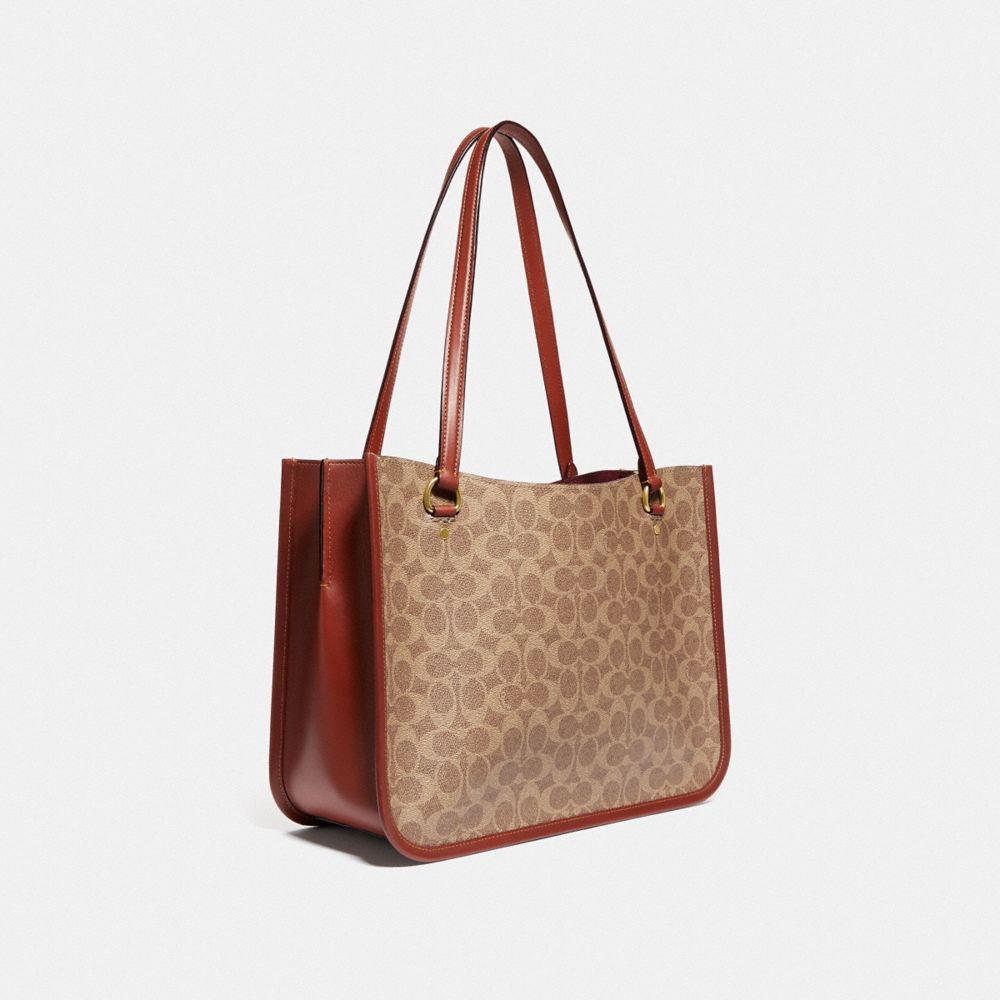 COACH®,TYLER CARRYALL IN SIGNATURE CANVAS,Signature Coated Canvas,Large,Brass/Tan/Rust,Angle View
