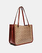COACH®,TYLER CARRYALL IN SIGNATURE CANVAS,Signature Coated Canvas,Large,Brass/Tan/Rust,Angle View