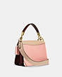 COACH®,BEAT SHOULDER BAG IN COLORBLOCK,Smooth Leather,Medium,Brass/Candy Pink Multi,Angle View