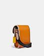 COACH®,CHARTER NORTH/SOUTH CROSSBODY WITH HYBRID POUCH IN COLORBLOCK,Smooth Leather,Mini,Butterscotch Multi,Angle View