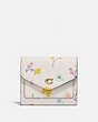 COACH®,WYN SMALL WALLET WITH WATERCOLOR FLORAL PRINT,Pebble Leather,Brass/Chalk Multi,Front View