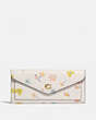 COACH®,WYN SOFT WALLET WITH WATERCOLOR FLORAL PRINT,Pebble Leather,Brass/Chalk Multi,Front View