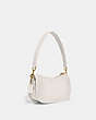 COACH®,SWINGER BAG 20,Smooth Leather,Small,Brass/Chalk,Angle View