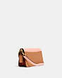 COACH®,BEAT CROSSBODY CLUTCH IN COLORBLOCK,Smooth Leather,Mini,Brass/Blush Natural Multi,Angle View