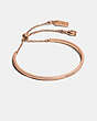 COACH®,SIGNATURE SLIDER BANGLE,Plated Brass,Rose Gold,Front View