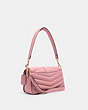 COACH®,GEORGIE SHOULDER BAG WITH PUFFY QUILTING,Small,Gold/True Pink,Angle View