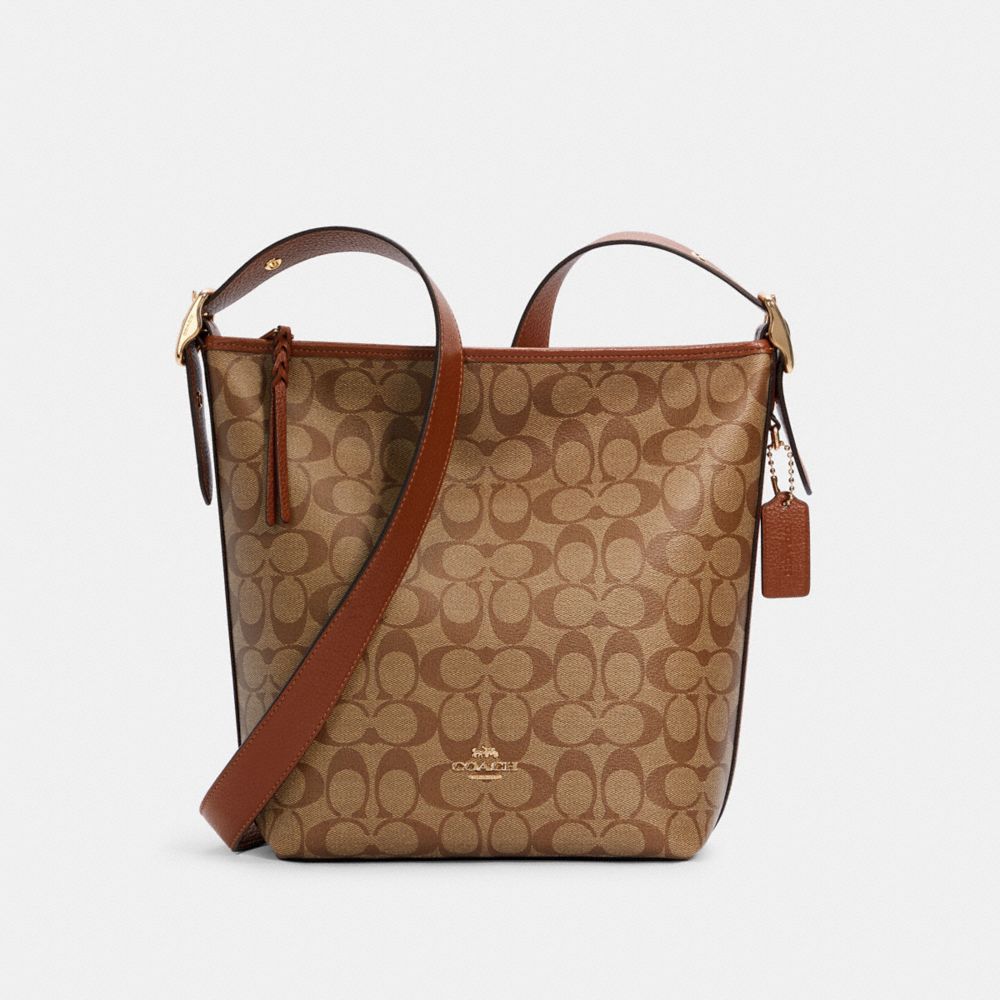 Coach Mini Abby Duffle Crossbody/Shoulder Bag in Signature PVC Leather :  : Clothing & Accessories