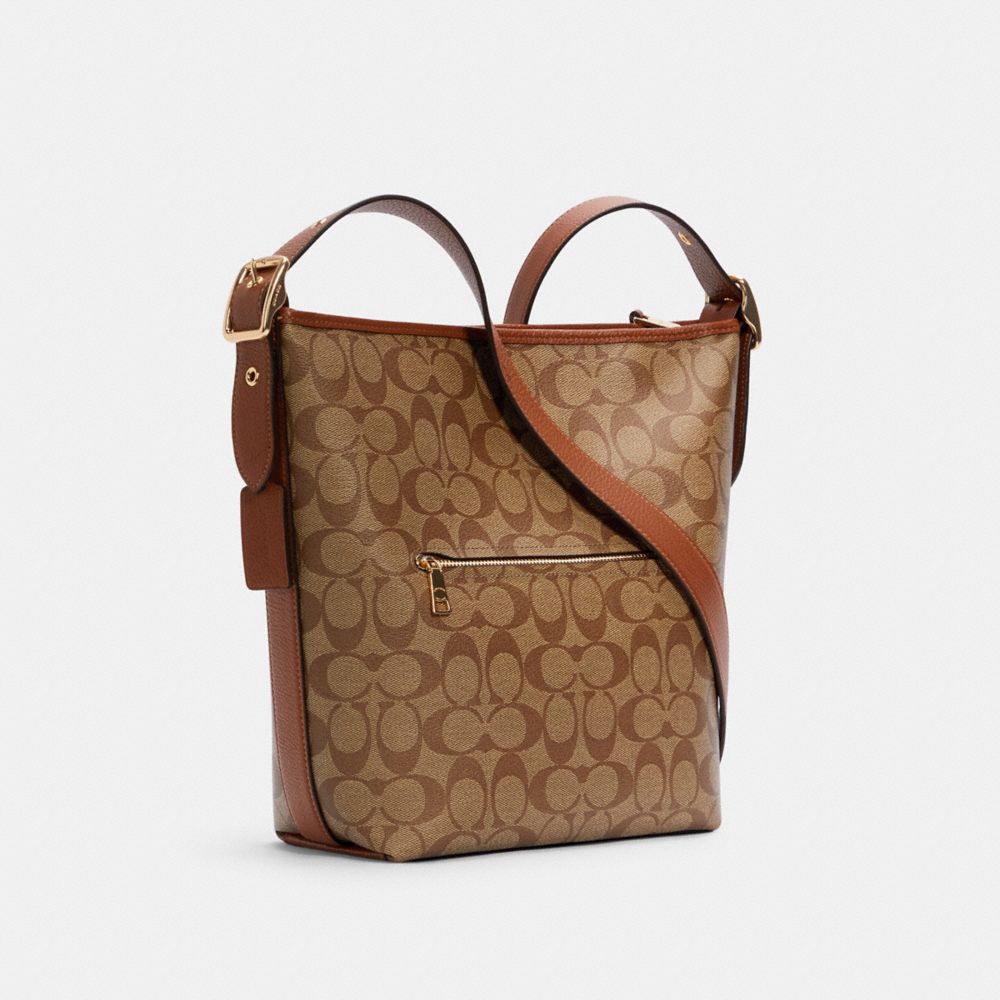 COACH®,VAL DUFFLE BAG IN SIGNATURE CANVAS,Medium,Gold/Khaki Redwood,Angle View