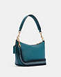 COACH®,DEMPSEY SHOULDER BAG WITH PATCH,Pebbled Leather,Small,Gold/Teal Ink,Angle View