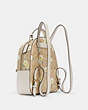 COACH®,JORDYN BACKPACK IN SIGNATURE CANVAS WITH DAISY PRINT,pvc,Gold/Light Khaki Chalk Multi,Angle View