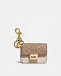 COACH®,MINI ALIE BAG CHARM IN SIGNATURE CANVAS,Signature Coated Canvas/Smooth Leather,Brass/Ivory/Taupe,Front View