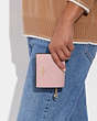 COACH®,SNAP WALLET,Pebbled Leather,Mini,Gold/Powder Pink,Detail View