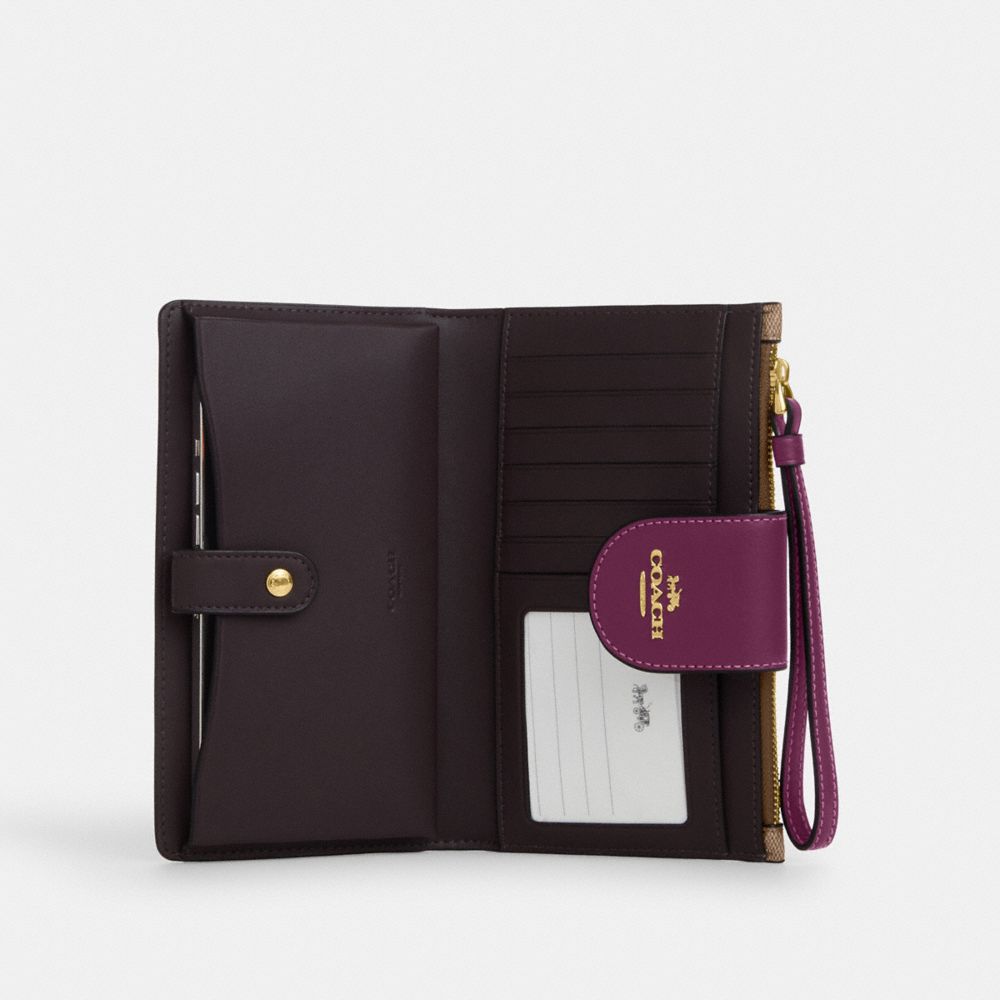 COACH®,PHONE WALLET IN COLORBLOCK SIGNATURE CANVAS,Signature Canvas,Gold/Khaki/Deep Berry,Inside View,Top View