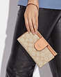 COACH®,PHONE WALLET IN COLORBLOCK SIGNATURE CANVAS,pvc,Gold/Light Khaki/Faded Blush,Detail View