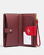 COACH®,PHONE WALLET IN COLORBLOCK SIGNATURE CANVAS,pvc,Im/Khaki/Electric Red,Inside View,Top View