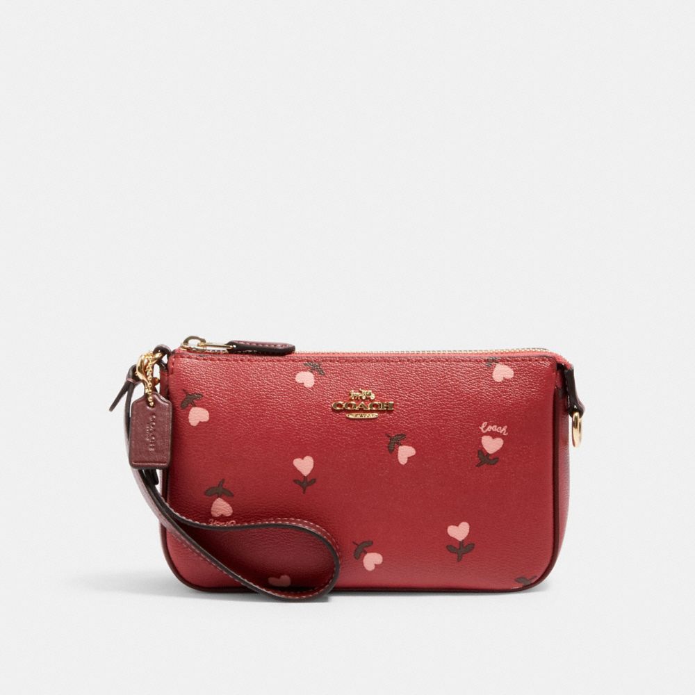 COACH®  Nolita 19 In Signature Canvas With Floral Whipstitch