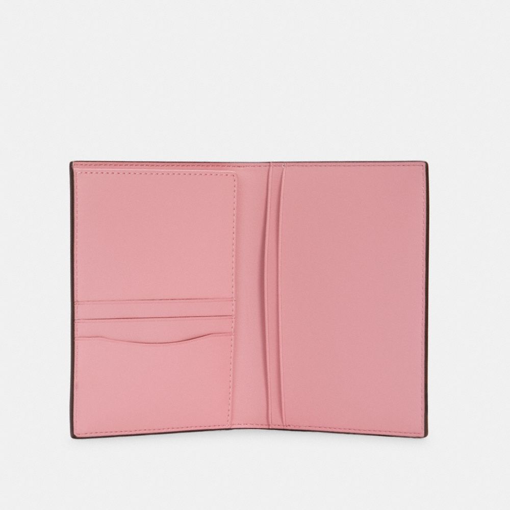 Buy the COACH Stripe Pink Signature Print Leather Passport Holder