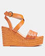 COACH®,ISABELA WEDGE,Leather,Candied Orange,Angle View