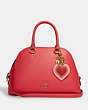 COACH®,70'S HEART BURST BAG CHARM IN SIGNATURE CANVAS,pvc,Mini,Gold/Pink Multi Khaki,Angle View