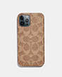 COACH®,IPHONE 12 PRO CASE IN SIGNATURE CANVAS,Signature Coated Canvas,Tan,Front View