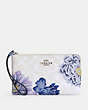 COACH®,LARGE CORNER ZIP WRISTLET IN SIGNATURE CANVAS WITH KAFFE FASSETT PRINT,Silver/Chalk Multi/Periwinkle,Front View