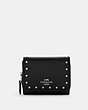 COACH®,SMALL TRIFOLD WALLET IN SIGNATURE CANVAS WITH RIVETS,pvc,Silver/Graphite/Black Multi,Front View