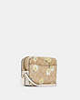 COACH®,MINI CAMERA BAG IN SIGNATURE CANVAS WITH DAISY PRINT,Gold/Light Khaki Chalk Multi,Angle View