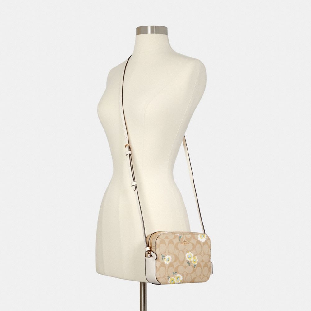 シグネチャー Daisy Print Mini Cally クロスボディー COACH® Outlet | Mini Cally Crossbody In Signature Canvas