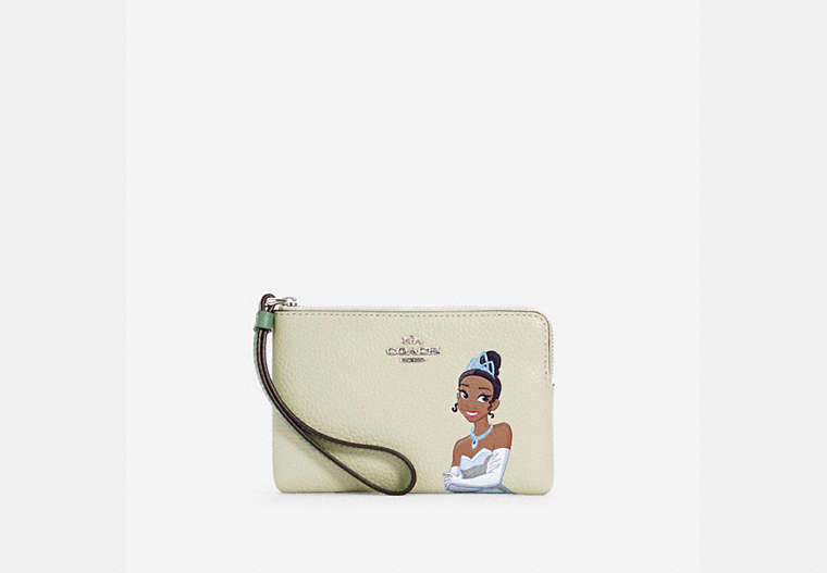 COACH®,DISNEY X COACH CORNER ZIP WRISTLET WITH TIANA,Silver/Washed Green Multi,Front View