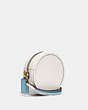 COACH®,KIA CIRCLE BAG IN COLORBLOCK,Pebble Leather,Small,Brass/Chalk Multi,Angle View