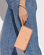COACH®,LONG ZIP AROUND WALLET,Leather,Mini,Gold/Faded Blush,Detail View
