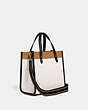 COACH®,FIELD TOTE 22 IN COLORBLOCK WITH COACH BADGE,Pebble Leather,Medium,Brass/Chalk Multi,Angle View