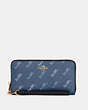COACH®,LONG ZIP AROUND WALLET WITH HORSE AND CARRIAGE DOT PRINT,Gold/Denim,Front View