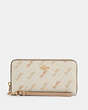 COACH®,LONG ZIP AROUND WALLET WITH HORSE AND CARRIAGE DOT PRINT,Gold/Cream,Front View
