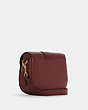 COACH®,GEORGIE SADDLE BAG IN COLORBLOCK,Leather,Medium,Gold/Cherry Multi,Angle View