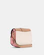 COACH®,GEORGIE SADDLE BAG IN COLORBLOCK,Leather,Medium,Gold/Taupe Multi,Angle View