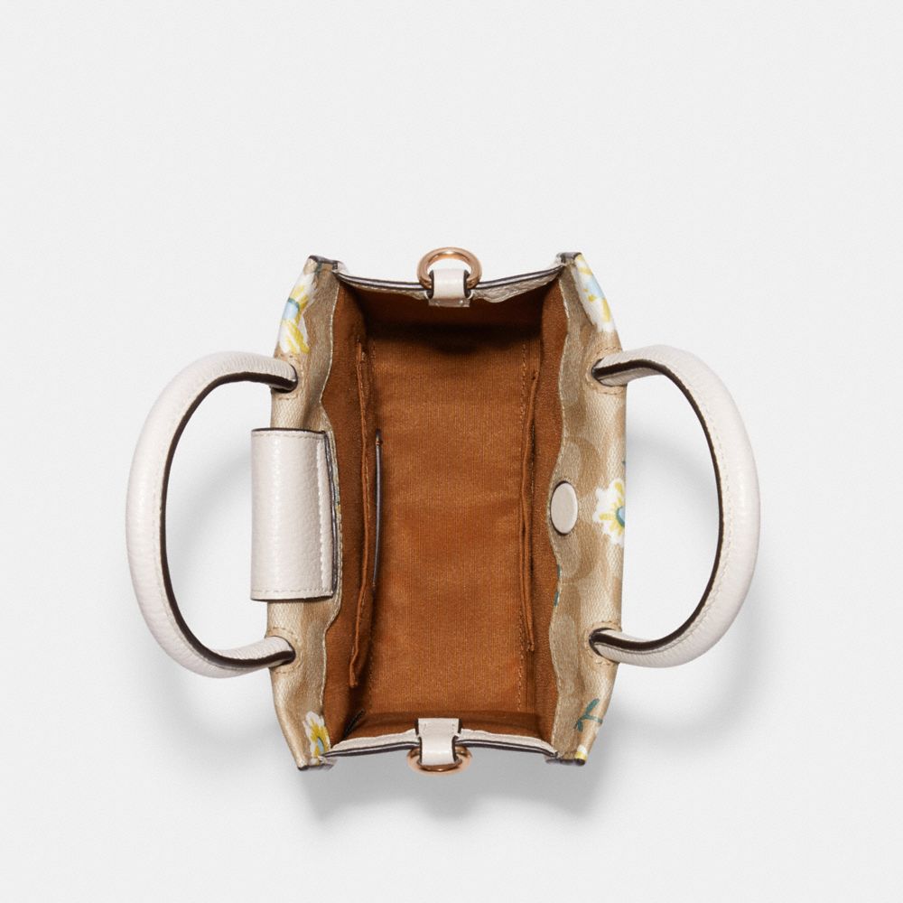 シグネチャー Daisy Print Mini Cally クロスボディー COACH® Outlet | Mini Cally Crossbody In Signature Canvas