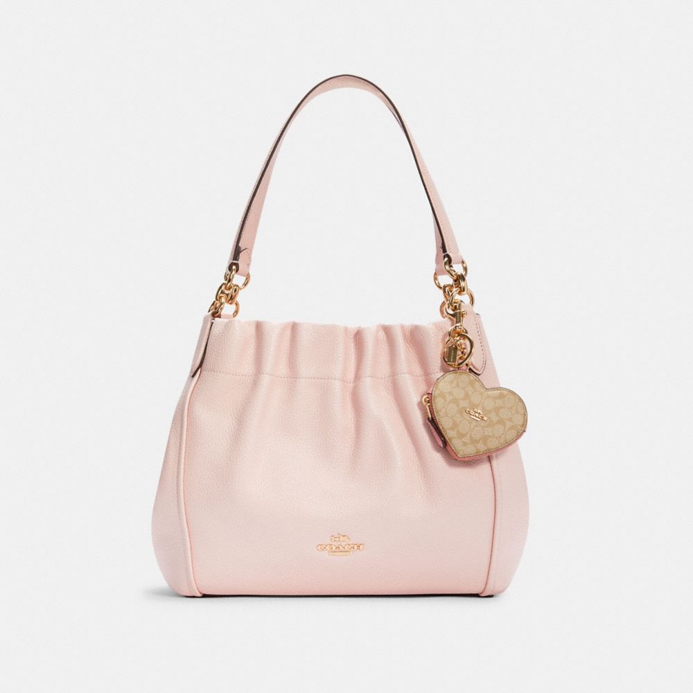 COACH®  Heart Pouch Bag Charm In Signature Canvas With Heart And Star Print