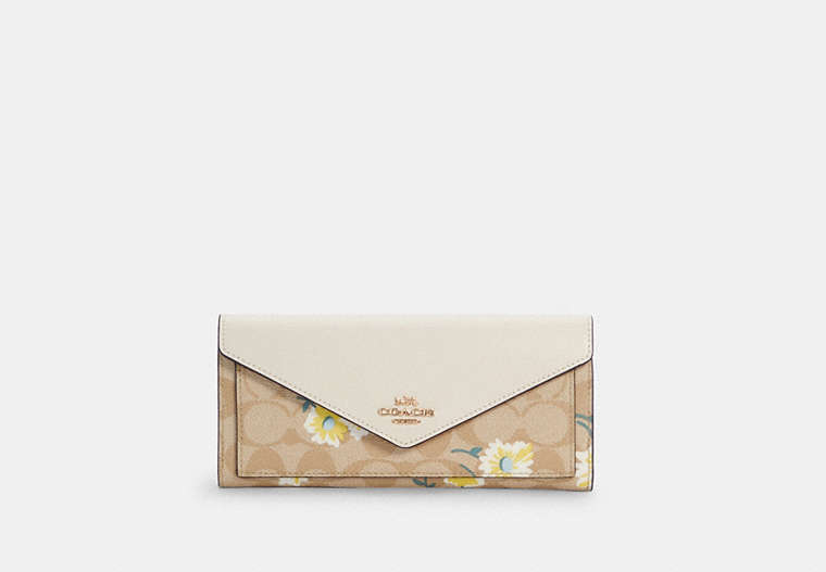 Portefeuille enveloppe slim en toile exclusive avec imprimé marguerite